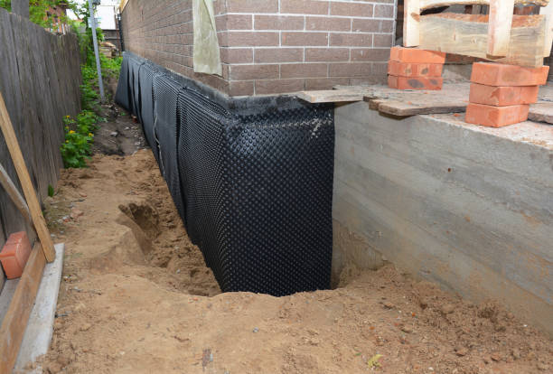 Happy homeowners after waterproofing job in Shipshewana